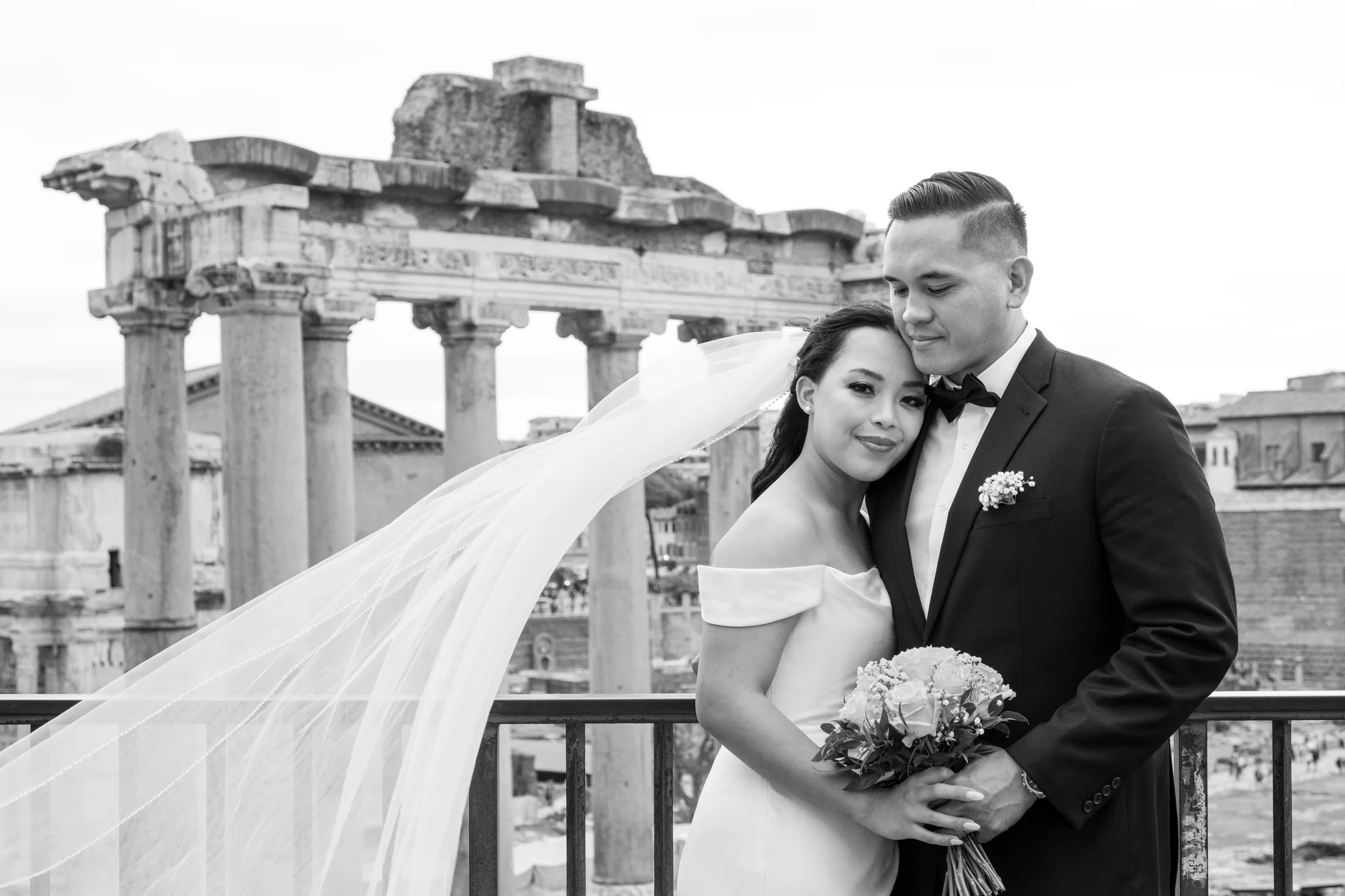 A newlywed couple overlooking the Roman Forum